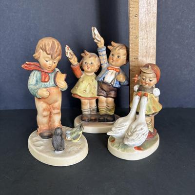 LOT 89: Hummel Figurines: Bird Watching, Goose Girl and Good-bye