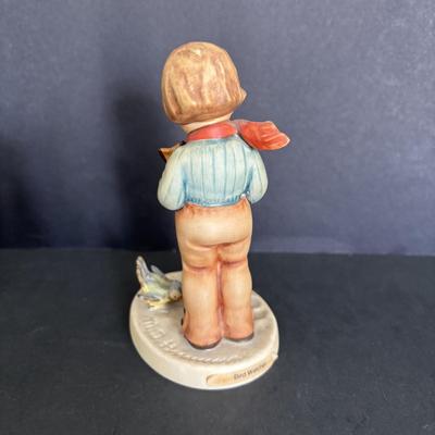 LOT 89: Hummel Figurines: Bird Watching, Goose Girl and Good-bye