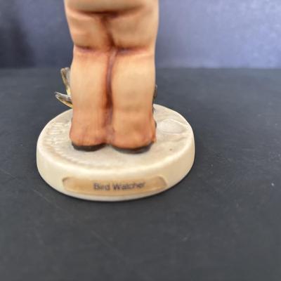 LOT 89: Hummel Figurines: Bird Watching, Goose Girl and Good-bye