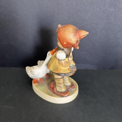 LOT 89: Hummel Figurines: Bird Watching, Goose Girl and Good-bye