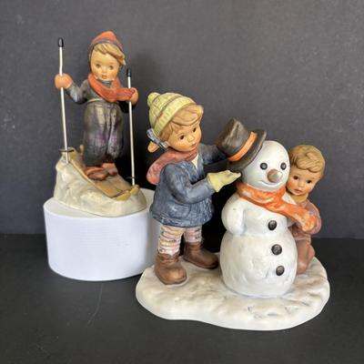 LOT 90: Hummel Figurines: Crowning Touch 1999 and Skier