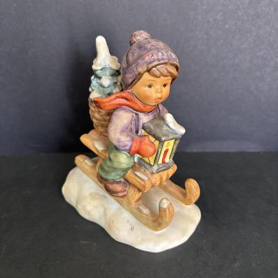 LOT 91: Hummel Figurines: Hear Ye Hear Ye, Let's Sing & Ride into Christmas