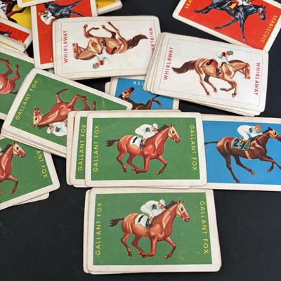 LOT 92: Vintage Marbles, Auto Bingo, Derby Board Game Pieces including Metal Horses, Playing Cards, Money, Place Tickets along with...