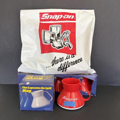 LOT 99: Snap On Grap Bag: The Captains No Spill Mugs, Bottle Opener & More