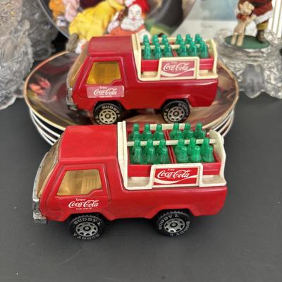 LOT 105: Coca-Cola Collection: Buddy L Toy Trucks, Sakura Stoneware Plates, Ornaments & More