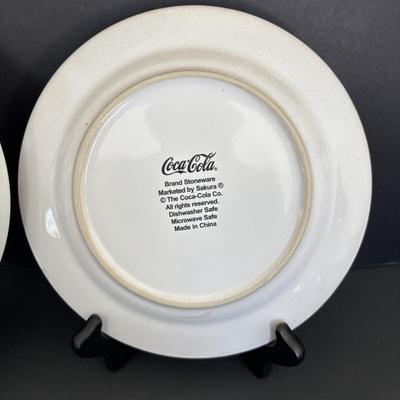 LOT 105: Coca-Cola Collection: Buddy L Toy Trucks, Sakura Stoneware Plates, Ornaments & More