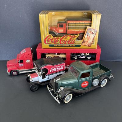 LOT 106: Coca-Cola Die Cast Trucks & Holiday Dual Classic Carrier Truck