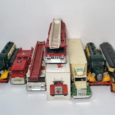 LOT 115: Collection of Seven Vintage HESS Holiday Trucks from Various Years