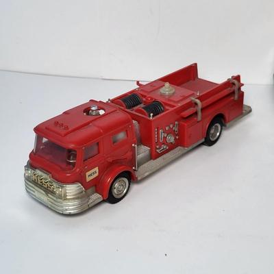 LOT 115: Collection of Seven Vintage HESS Holiday Trucks from Various Years