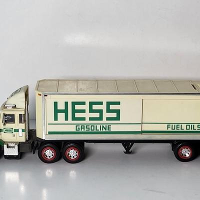 LOT 115: Collection of Seven Vintage HESS Holiday Trucks from Various Years