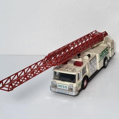LOT 115: Collection of Seven Vintage HESS Holiday Trucks from Various Years