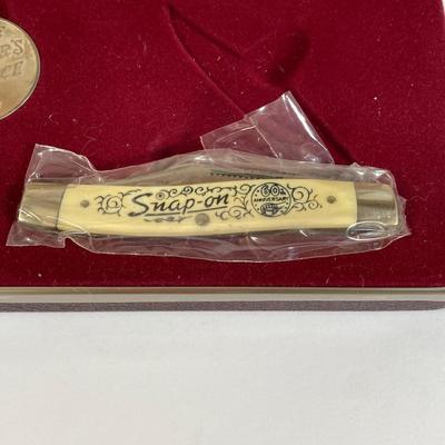 LOT 158: Snap-on 60th Anniversary Commemorative Limited Edition Coin and Knife Set with 60th Anniversary Belt Buckle