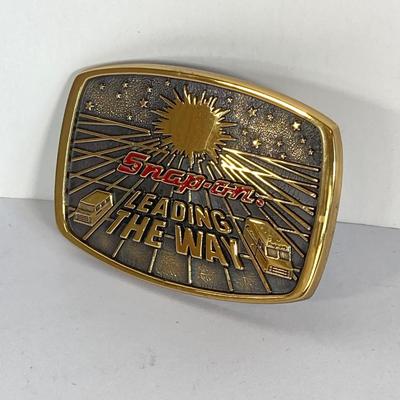LOT 161: Snap-on 70th Anniversary and Leading the Way Brass Belt Buckles