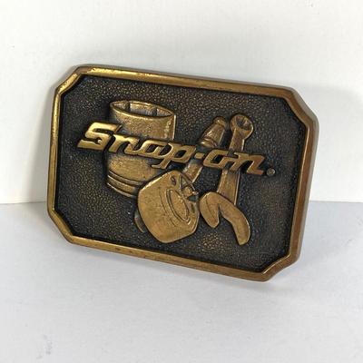 LOT 190: Brass Belt Buckles - Snap-on and Movin Proud