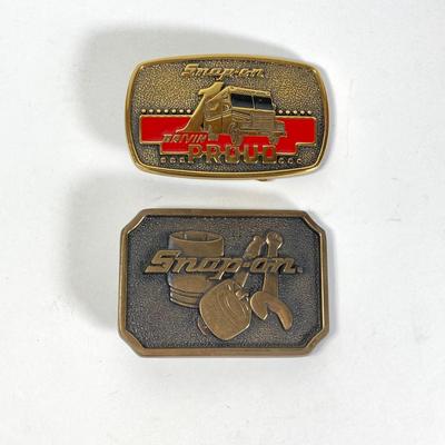 LOT 190: Brass Belt Buckles - Snap-on and Movin Proud