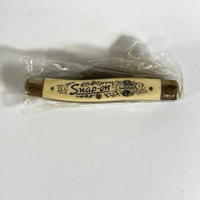 LOT 191: Snap-on 60th Anniversary Commemorative Knife / Coin Set with 60th Anniversary Belt Buckle