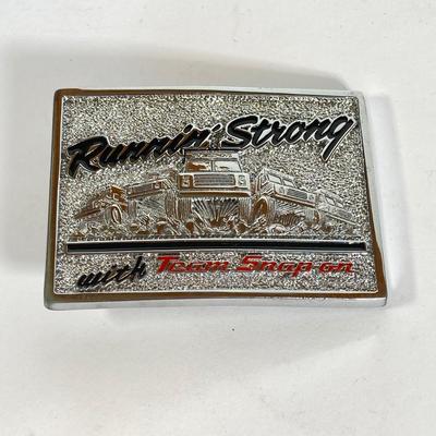 LOT 192: Snap-on Belt Buckles - Drivin Proud Brass and Runnin Strong with Team Snap-on Chrome on Brass