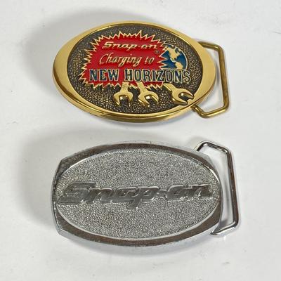 LOT 196: Pair of Snap-on Belt Buckles - Charging to New Horizons (Solid Brass) and Snap-on (Chrome on Solid Brass)