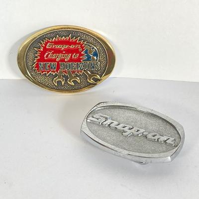 LOT 196: Pair of Snap-on Belt Buckles - Charging to New Horizons (Solid Brass) and Snap-on (Chrome on Solid Brass)
