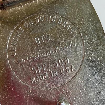 LOT 196: Pair of Snap-on Belt Buckles - Charging to New Horizons (Solid Brass) and Snap-on (Chrome on Solid Brass)