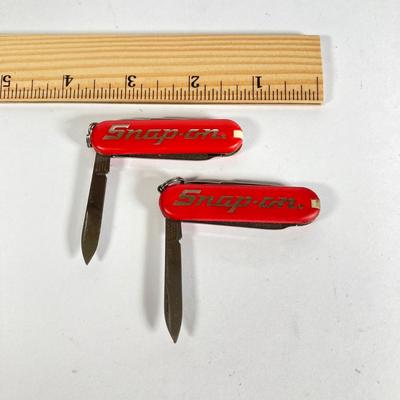 LOT 197: Ford and Snap-on Collection - Commemorative Mustang Belt Buckle, American Classics Decal, Victorino Switzerland Knives and...