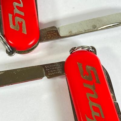 LOT 197: Ford and Snap-on Collection - Commemorative Mustang Belt Buckle, American Classics Decal, Victorino Switzerland Knives and...