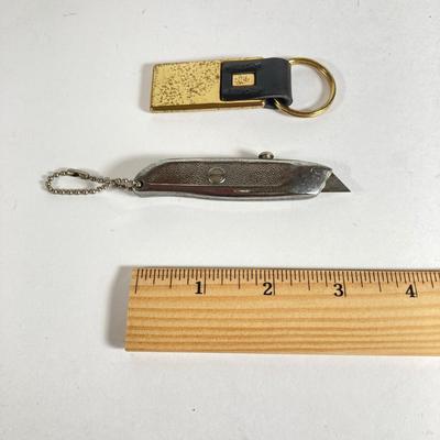 LOT 199: Snap-on Tools "The Master's Choice" Brass Tire Gauge, 70th Anniversary Key Chain and Miniature Utility Knife