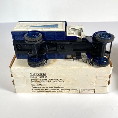 LOT 200: Salem County Fair Association Ertl 1925 Kenworth Toy Truck Bank, Sovereign Toy Truck and Miniature Dupont #24 Tractor Trailer...