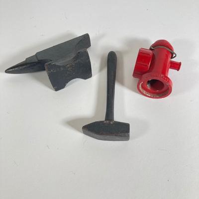 LOT 203: Collection of Cast Iron Miniatures - Salt and Pepper, Seesaw,, Sand Timer, Anvil, Tonka Toy Fire Hydrant, Skillet, Hammer and More