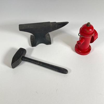 LOT 203: Collection of Cast Iron Miniatures - Salt and Pepper, Seesaw,, Sand Timer, Anvil, Tonka Toy Fire Hydrant, Skillet, Hammer and More