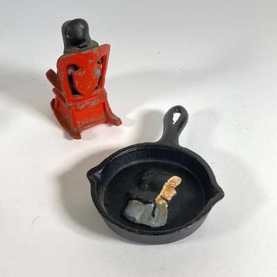 LOT 203: Collection of Cast Iron Miniatures - Salt and Pepper, Seesaw,, Sand Timer, Anvil, Tonka Toy Fire Hydrant, Skillet, Hammer and More