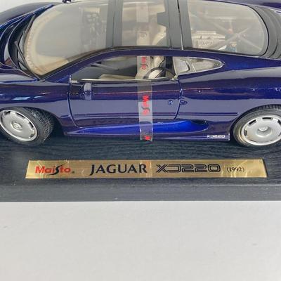 LOT 204: Collectible Diecast Cars - 1957 Chevrolet Corvette and Maisto 1992 Jaguar XJ220 in Original Box