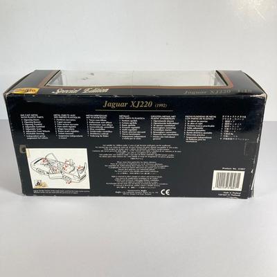 LOT 204: Collectible Diecast Cars - 1957 Chevrolet Corvette and Maisto 1992 Jaguar XJ220 in Original Box