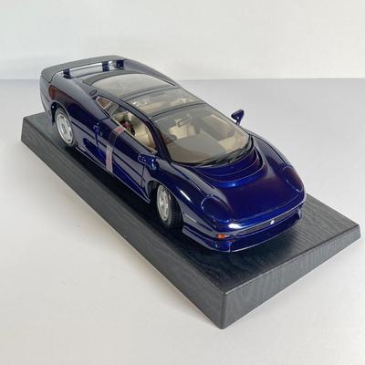 LOT 204: Collectible Diecast Cars - 1957 Chevrolet Corvette and Maisto 1992 Jaguar XJ220 in Original Box
