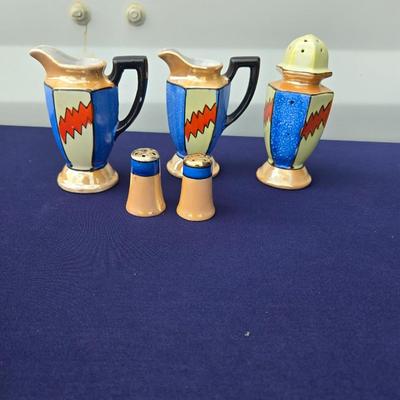 Sale Photo Thumbnail #16: Art Deco Lustreware set of pitchers
And 3 shakers