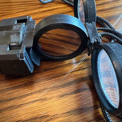 BUSHNELL 10X-30X50 BINOCULARS AND A MILITARY STYLE SURVIVAL TOOL