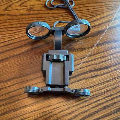 BUSHNELL 10X-30X50 BINOCULARS AND A MILITARY STYLE SURVIVAL TOOL