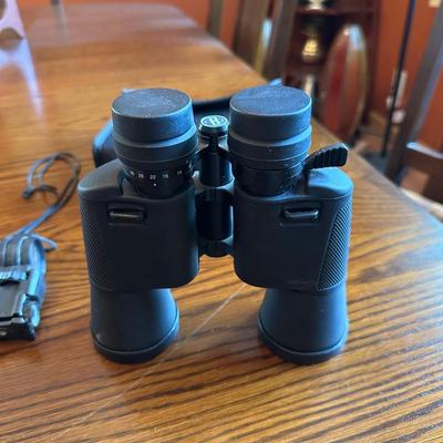 BUSHNELL 10X-30X50 BINOCULARS AND A MILITARY STYLE SURVIVAL TOOL