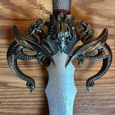 SWORD WITH A VERY UNIQUE HANDLE