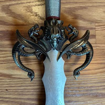 SWORD WITH A VERY UNIQUE HANDLE