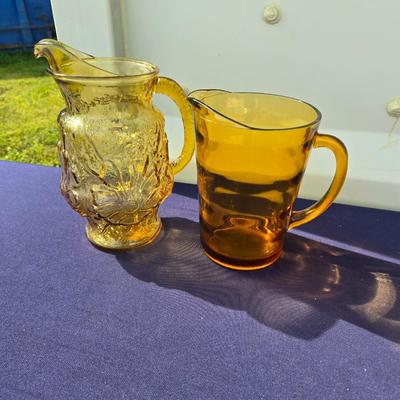 Sale Photo Thumbnail #53: 2 amber pitchers