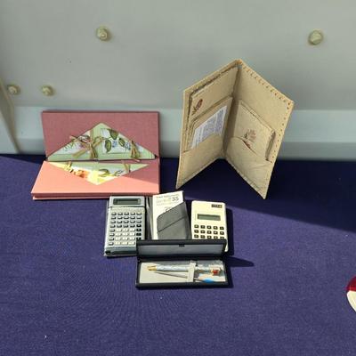 Sale Photo Thumbnail #54: 2 calculators
Note cards
Apple pen with ink refill