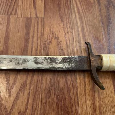 SWORD WITH AN ENGRAVED BLADE