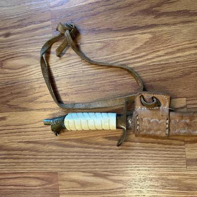 SWORD WITH AN ENGRAVED BLADE
