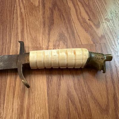 SWORD WITH AN ENGRAVED BLADE