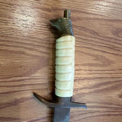 SWORD WITH AN ENGRAVED BLADE