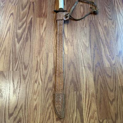 SWORD WITH AN ENGRAVED BLADE