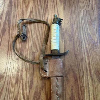 SWORD WITH AN ENGRAVED BLADE