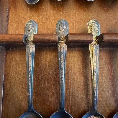 SOUVENIR SPOONS AND A WALL HUNG HOLDER