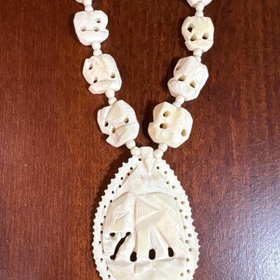 Vintage 1970s carved elephant necklace